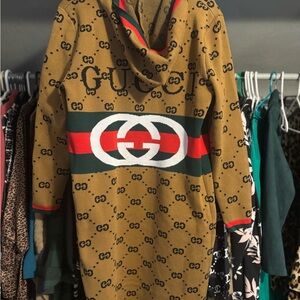 Tan Hooded Sweatshirt with Logo Pattern